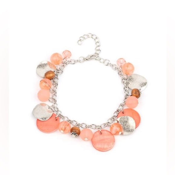 Silver And Coral Multi Charm Bracelet.
